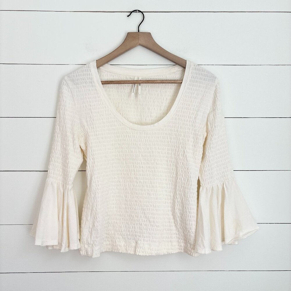 Anthropologie cream textured top with flare sleeve